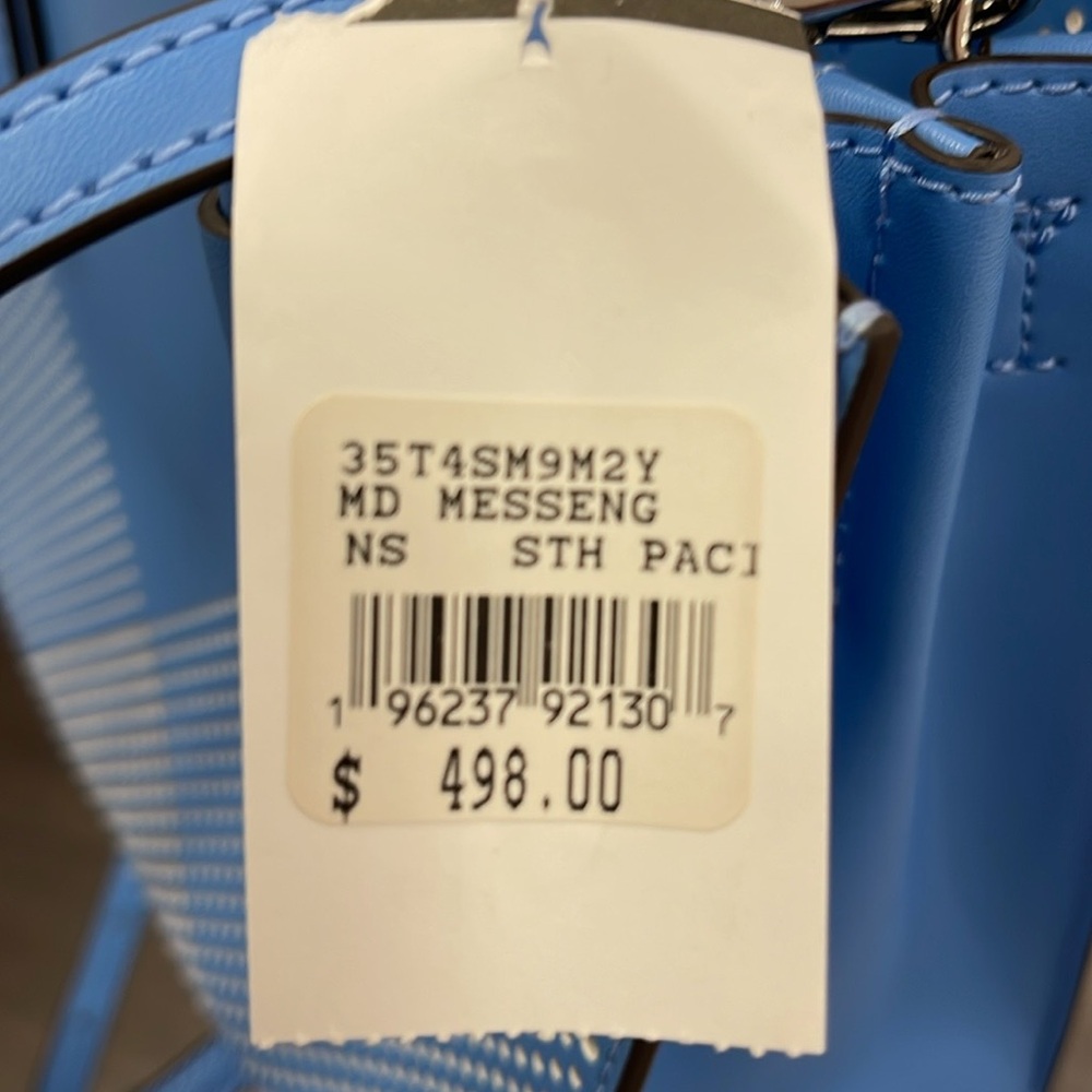 Michael Kors Mercer Medium Perforated Crossbody Satchel Bag
South Pacific 
NWT - Picture 9 of 16